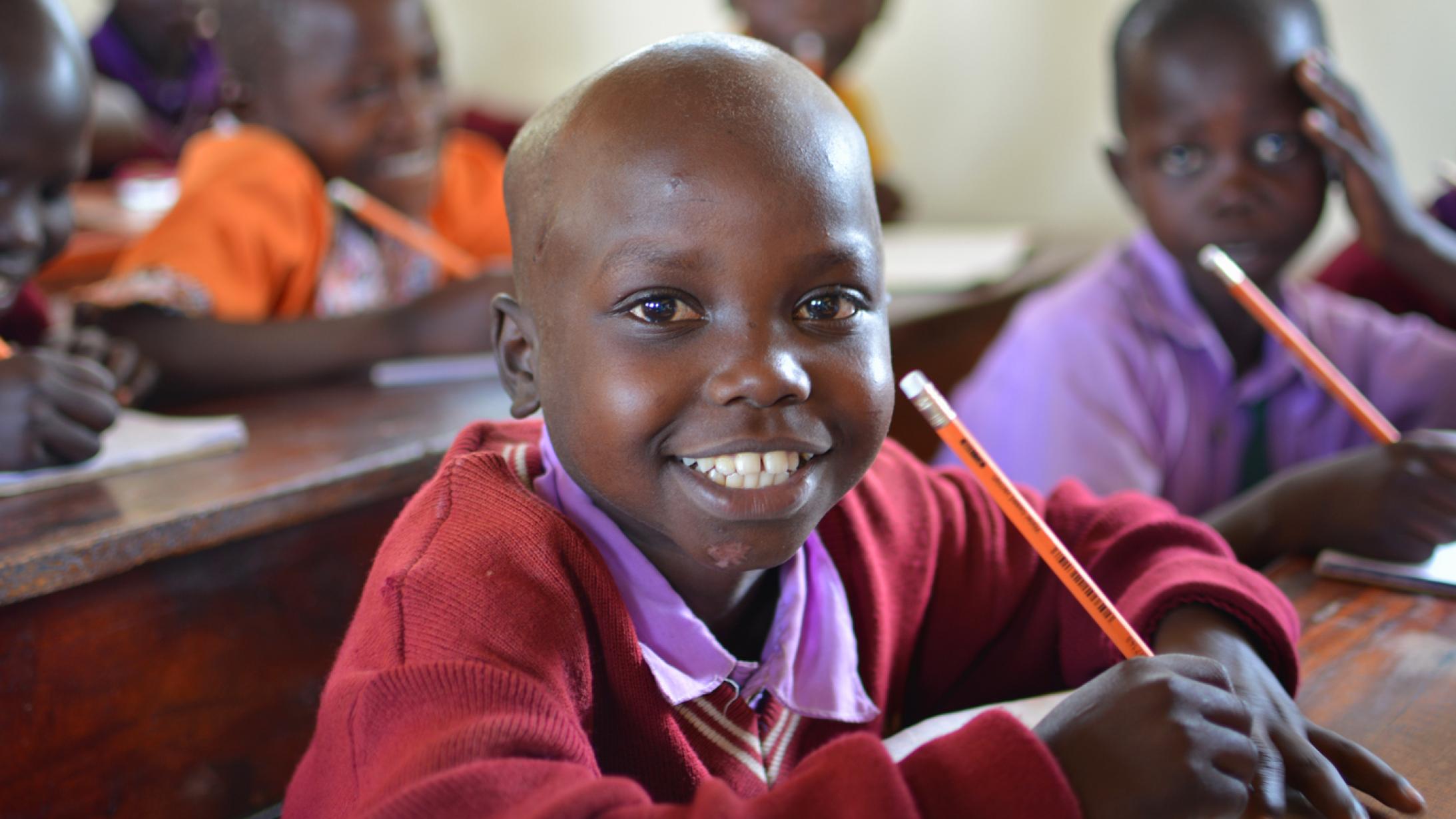 Jahresbericht Schulkind Uganda