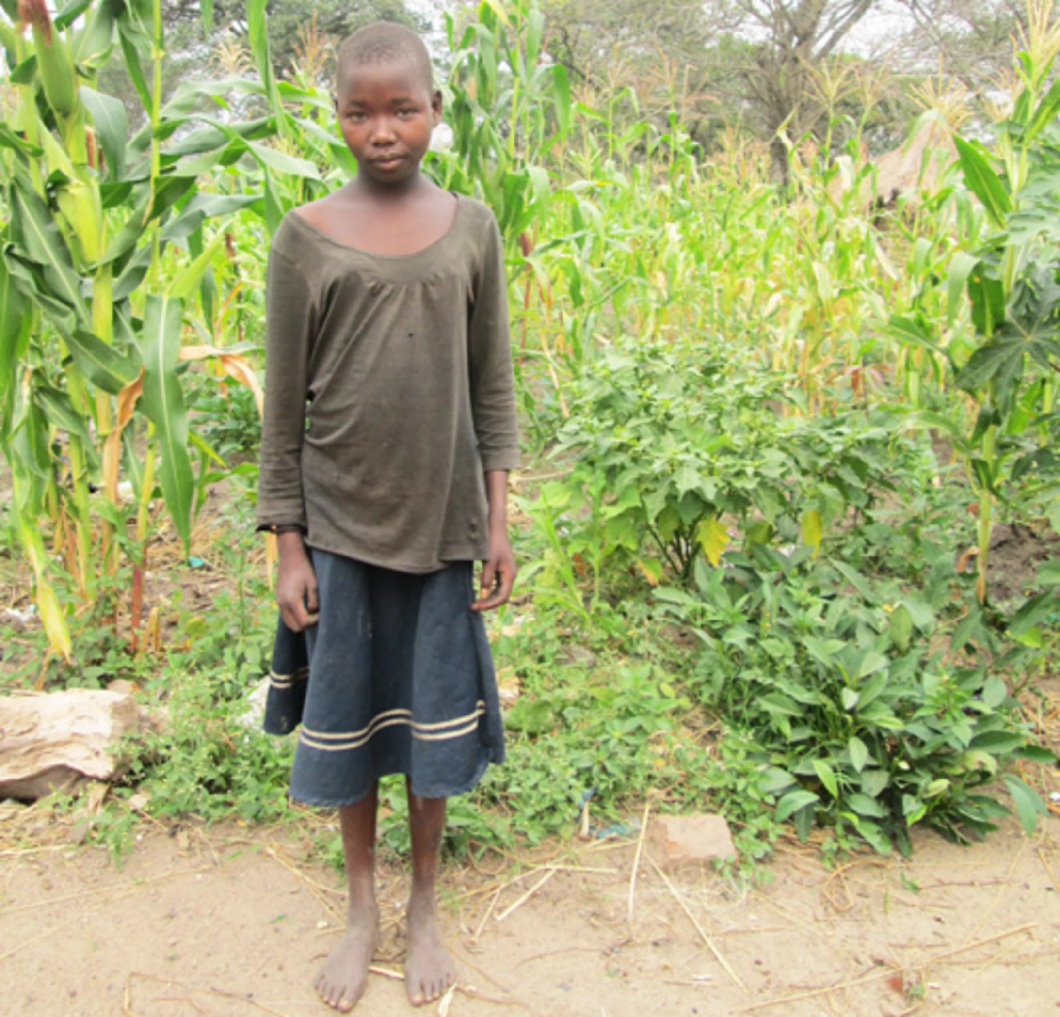 Oscar Alimocan, 13 Jahre, Schülerin aus Uganda. Oscar Alimocan, 13 Jahre, Schülerin aus Uganda.